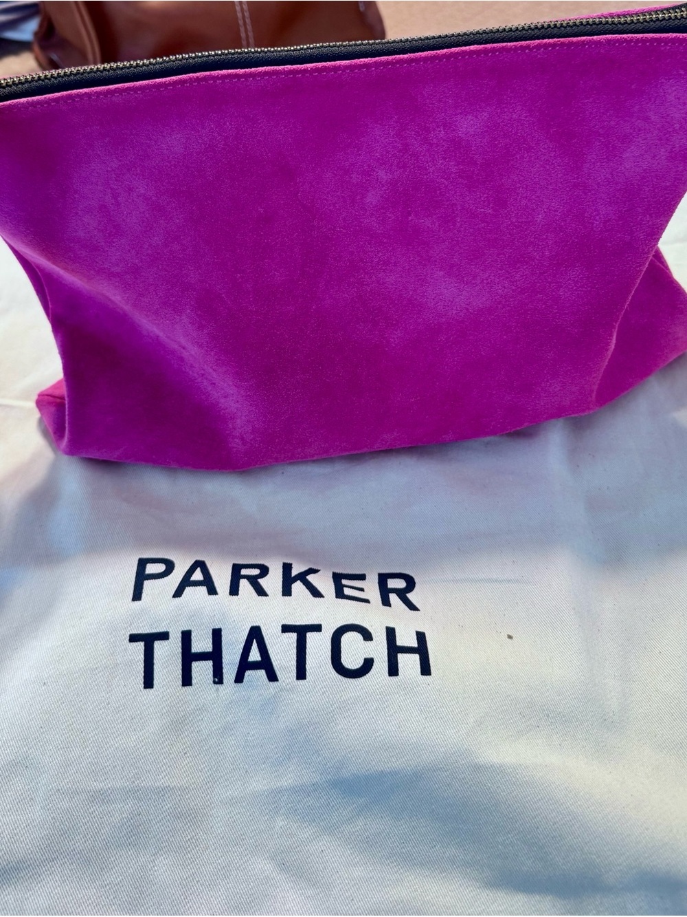 NWOT Hot Pink Suede Zip Bag with red accents